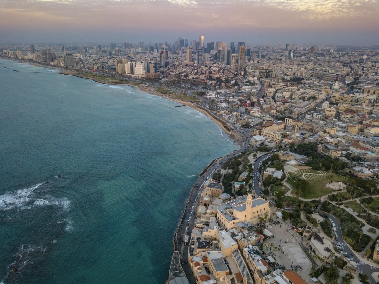 Tel Aviv skyline at sunset over the Mediterranean coastline